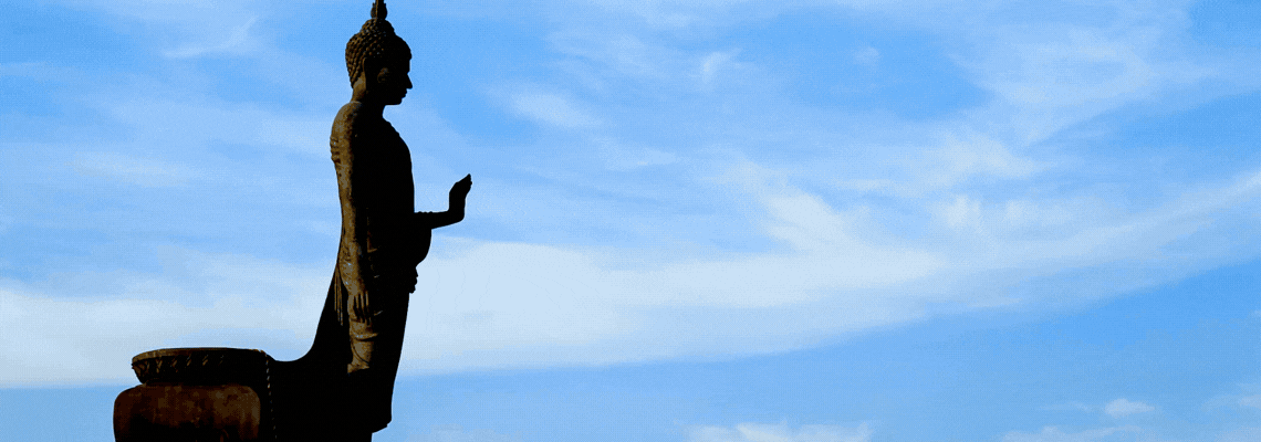 Buddha stood in clouds